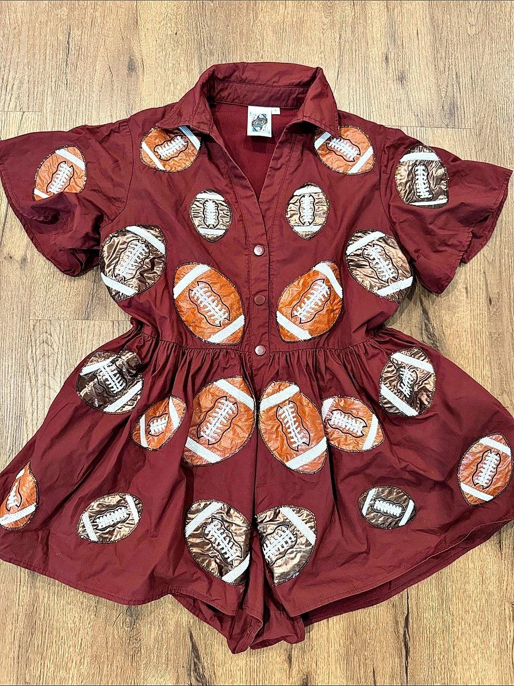 Queen of Sparkles Maroon Football Print Romper